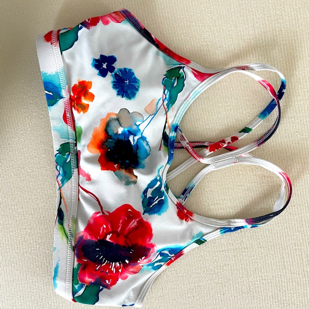 Born primitive medium sports bra.